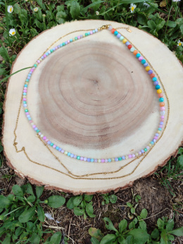 Naszyjnik z muszli naturalnej i stali szlachetnej. Długość 28 cm plus przedłużka 5 cm